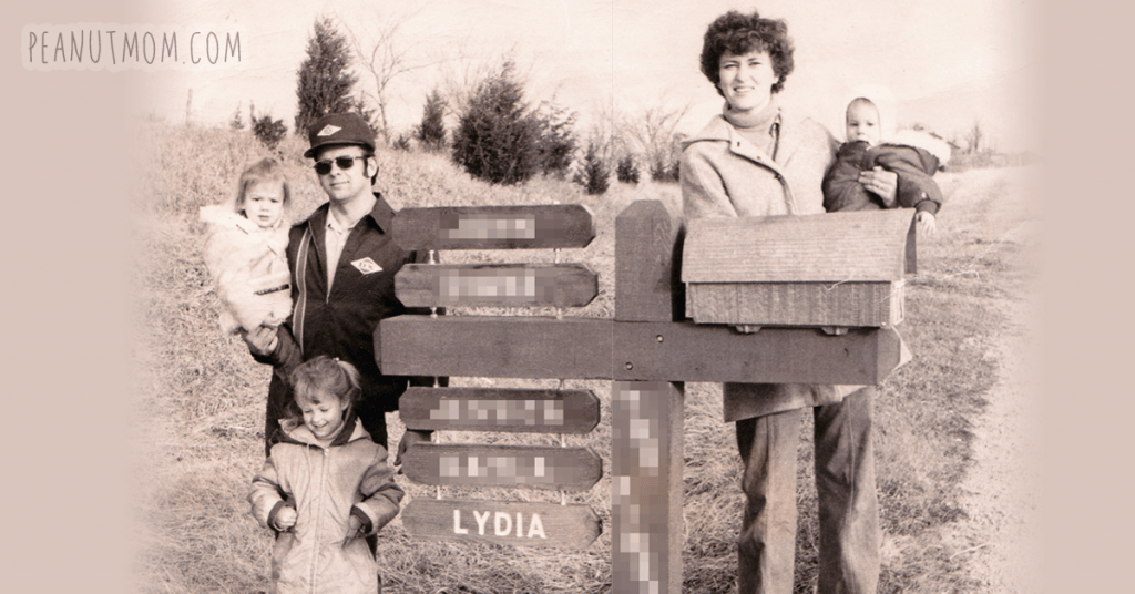We lived on a highway when I was a kid, and our mailbox kept getting Louisville Slugger'd, so my dad built one on a huge-ass post that was buried 12 feet into the ground and set with concrete. He added kiddos each time they had another. I'm the little one in my mother's arms, in what I liked to call "The Happy Time" before my younger sister came along and knocked me off my 'youngest child' throne. ;-)